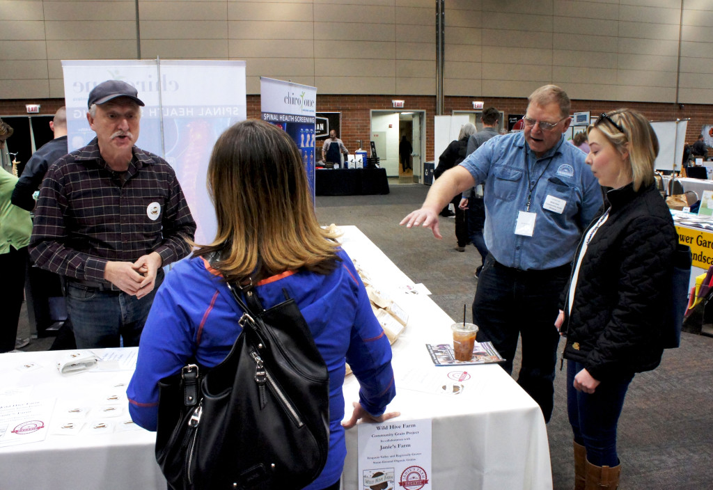 Don Lewis (left) discusses the high-quality grains produced by his Wild Hive Farm in New York's Hudson Valley. He is now partnering with producers in Illinois, such as organic grower Harold Wilken (right) of Janie's Farm in Danforth, Illinois, to foster the already expanding interest in better Midwestern grain.