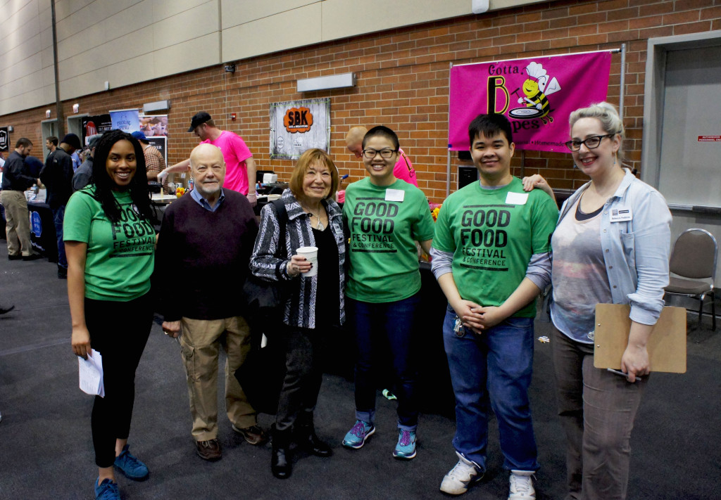 FamilyFarmed could not stage a successful three-day event without the hard work of our volunteers. Here three volunteers (in green shirts) posed for a photo at the Good Food Festival on March 26 with FamilyFarmed Board Chairman Charlotte Flinn (third from left); Bob Flinn, her husband (second left); and Rebecca Frabizio (right) of the FamilyFarmed staff.
