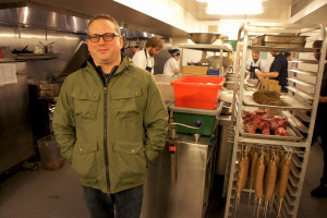 Award-winning Chicago chef Paul Kahan in the busy kitchen of Publican Quality Meats, one of eight establishments currently run by his One Off Hospitality Group. Kahan will receive FamilyFarmed's Good Food Chef of the Year Award for his dedication to local sourcing and sustainability at the Good Food Festival on March 26.