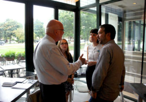 Kara Gunthop (second left) and Greg Gunthorp (right) chatted with Richard Wood of the Food Animal Concerns Trust and Alexandra Frantz of Animal Welfare Approved prior to a panel discussion on sustainable livestock production. The event, staged by the Community Dining group, took place at Chicago's Jam restaurant on Aug. 18, 2016. Photo: Bob Benenson/FamilyFarmed